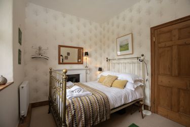 Bedroom Bedroom three has a lovely feature brass double bed.