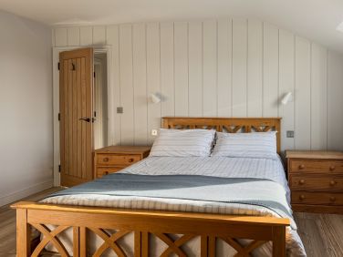 The newly refurbished en-suite king bedroom with sea views.