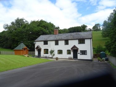 In the corner of the large garden you will find the BBQ cabin.
