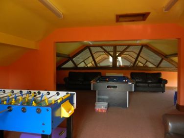 The games room where you can play pool, table football, watch TV and look after the children!!