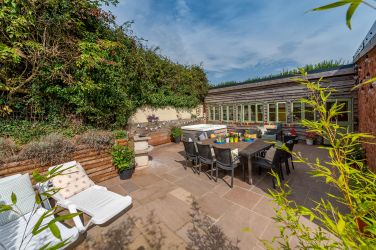 Large terrace with hot tub, BBQ and outdoor dining