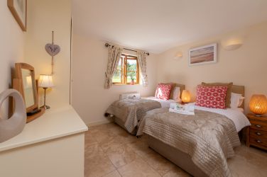 Bedroom set up as twin beds
