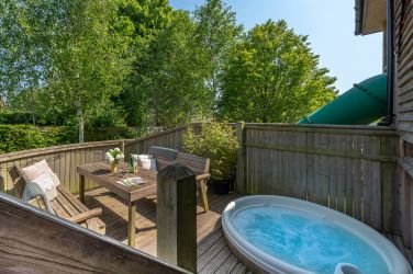 Hot tub sunk into the decking