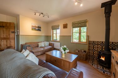 Cosy sitting area with wood burning stove