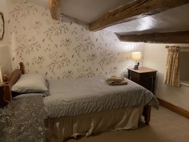 Forth bedroom with single bed