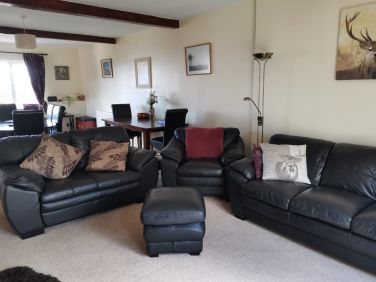 Comfortable spacious lounge dining room.