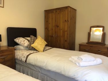 Twin bedroom has TV.dvd player