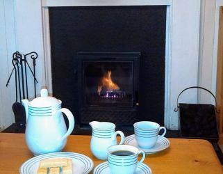 Relax by the sitting room fire