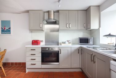 Kitchen with coffee machine