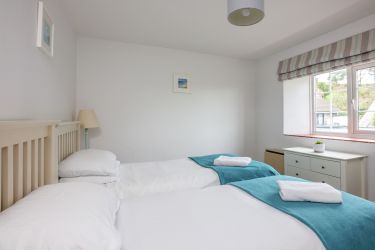 Twin bedroom with wardrobe