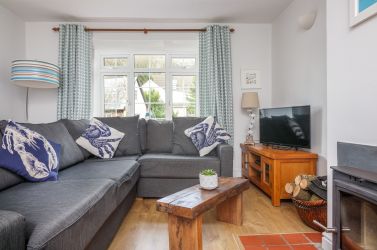 Lounge with wood burning stove and superfast wifi