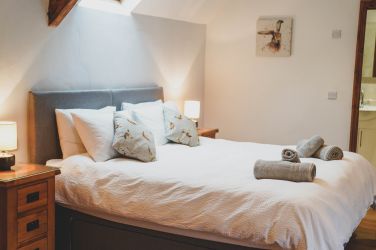 Upstairs bedroom, large room with super king.