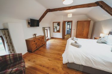 Large upstairs bedroom.