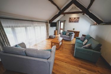 Up stairs living room with sofa bed if needed. Lovely rural views