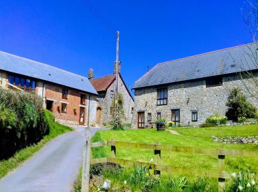 Hawley farm showing the holiday accommodation The Cider Press, Wagon House and The Stables.