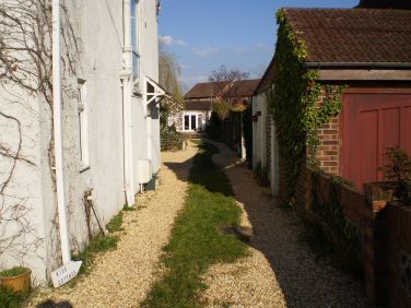 Short drive past our house to Kiss Cottage.