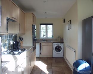 Kitchen - dishwasher, washing machine and fridge-freezer near right