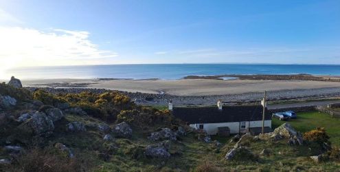 Behind cottage panoramic view