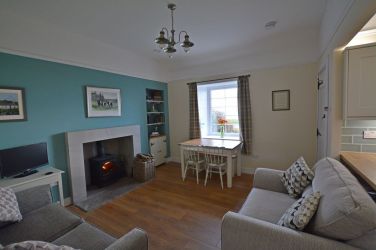 Living room with double bed settee and second 2 seater settee