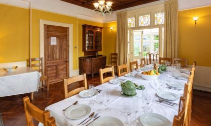 Dining room at Fairlea Grange with French doors in to sun lounge