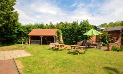 Out door seating and covered hot tub Fairlea Grange