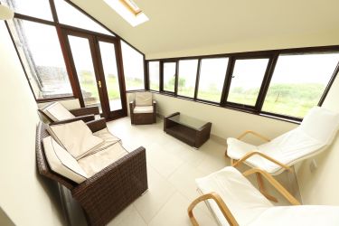 The sunroom has a spectacular view across to Cautley Spout & The Howgills.