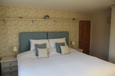 Bedroom 2 can be queen or singles