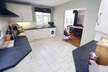 Kitchen looking through to dining room