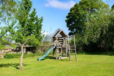 Swing & slide set for the younger guests.