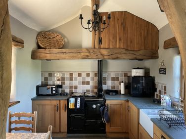 The beautifully crafted kitchen. Local slate on floor and worktops