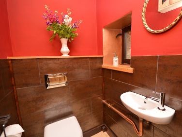 The downstairs cloakroom has a character all of its own!