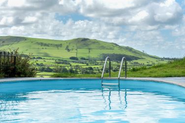 Exclusive Use Heated Outdoor Pool. Open May to September.