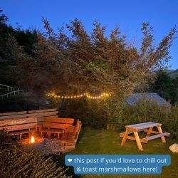 The old Farmhouse garden with fire pit