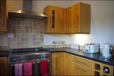 Cook up a storm in the well equipped kitchen.