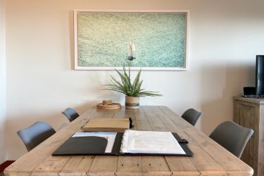 Reclaimed wood dining table with seating for four