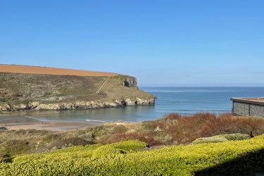 View of the sea and headland from the communal lawn
