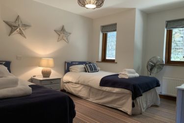 Second bedroom with two single beds