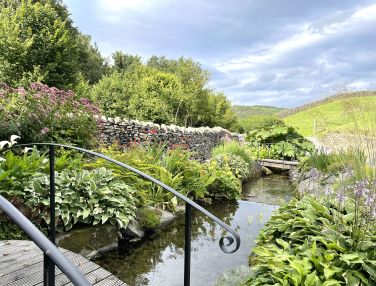 A peaceful garden in which to unwind. Upstairs at Otley Beck next