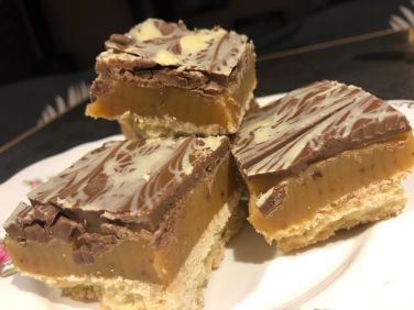 Home made millionaires shortbread. Just one of our sweet options welcome pack.