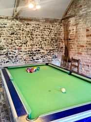 Games room with pool table and dartboard