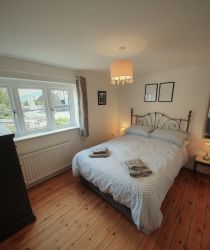 Bedroom 2 with ensuite and king sized bed