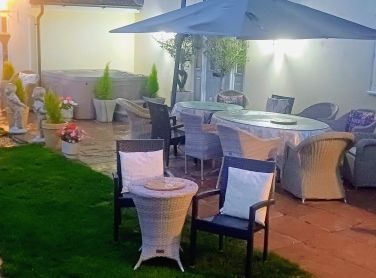 Patio area in the hot summer the hot tubs can be used to cool down