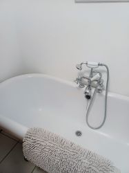 Roll top bath with mixer shower in bath  perfect for a long soak