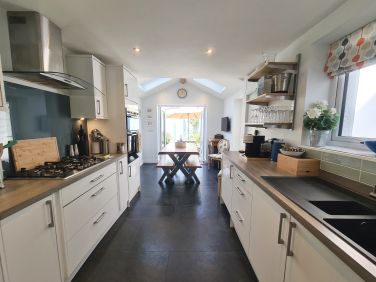 Spacious, well equipped kitchen with underfloor heating. ©Aeolian Holiday Cottage