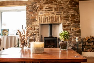 In autumn and winter months a wood burner log fire is lovely to enjoy.