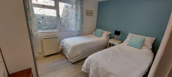 2nd bedroom that be configured as a double or twin based on requirement.