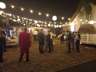 The cobbled courtyard with the bar beyond