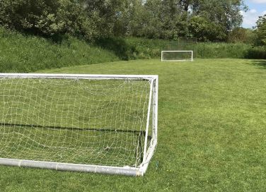 Mini football pitch on site