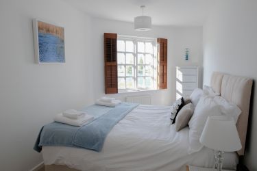 Bedroom 3, with a Superking double bed. Lake view.