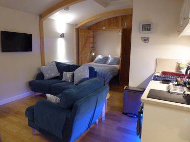 The interior of the beach house at night.